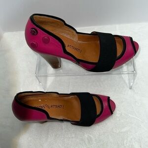 Opposites attract Spencer pink and black slip on heels. Size 6.5. EUC.